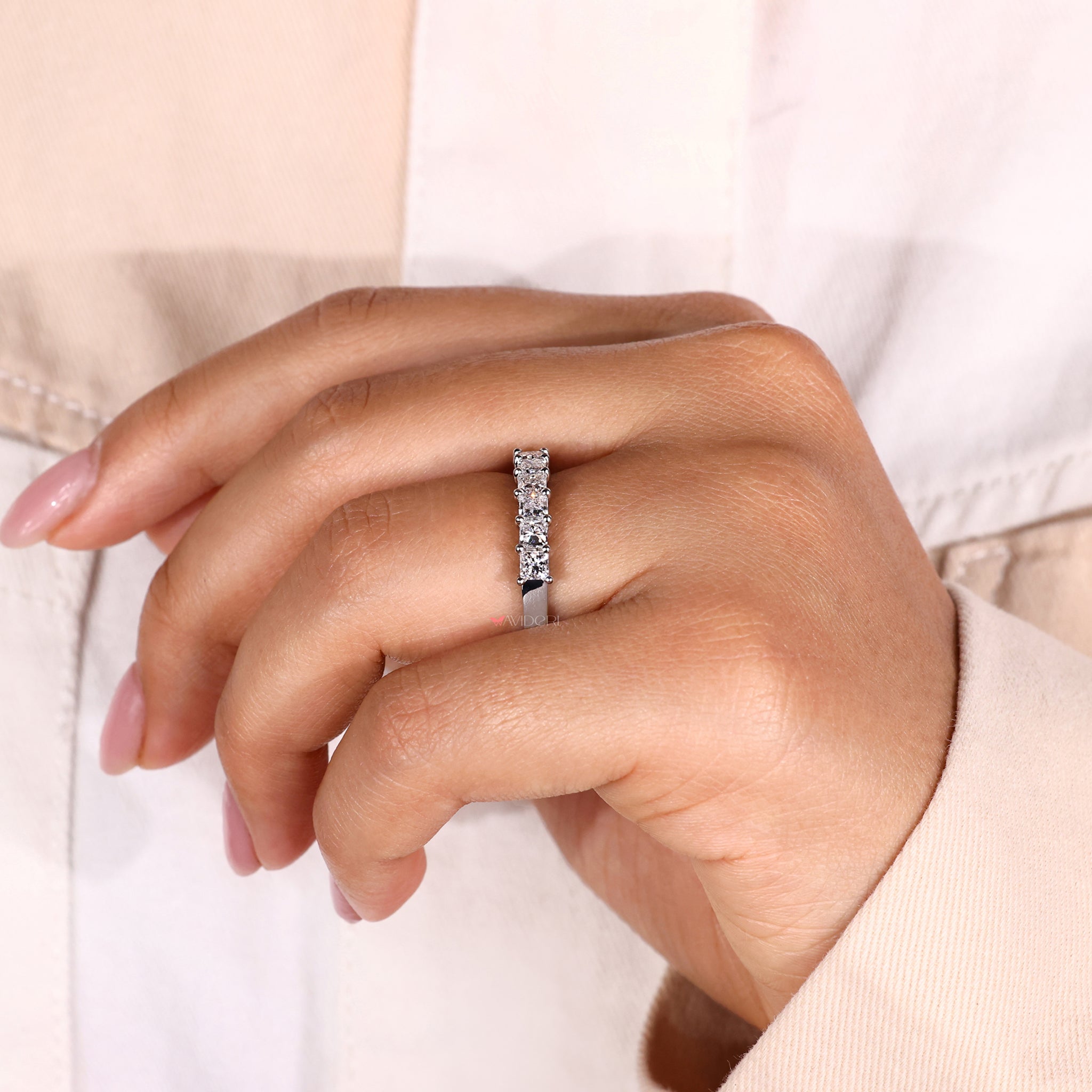 Beautiful princess cut diamond band ideal for couples looking for a classic and opulent look.
