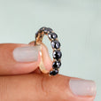 Black round rose cut moissanite wedding band shines with bold beauty.