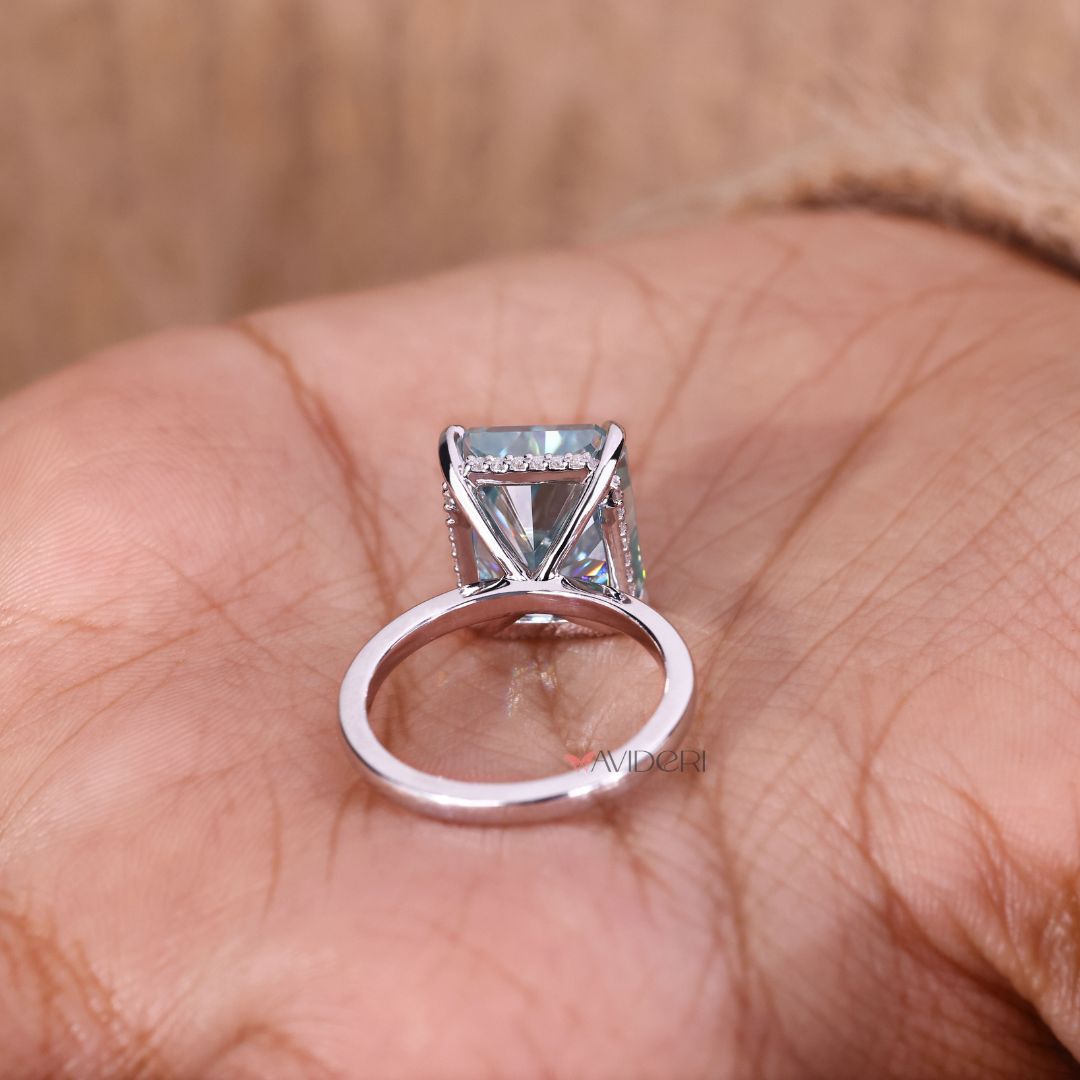 The white gold engagement ring glows with soft elegance.
