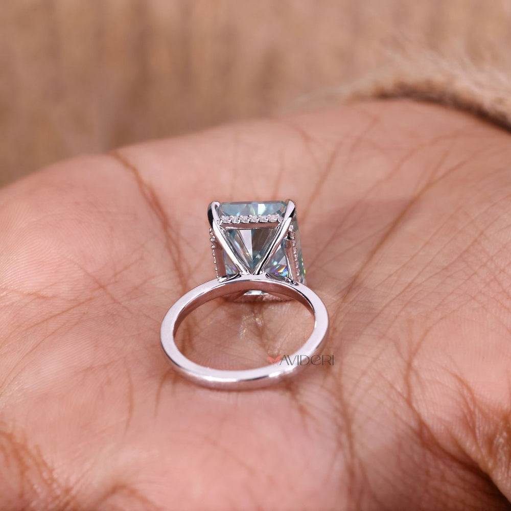 The white gold engagement ring glows with soft elegance.
