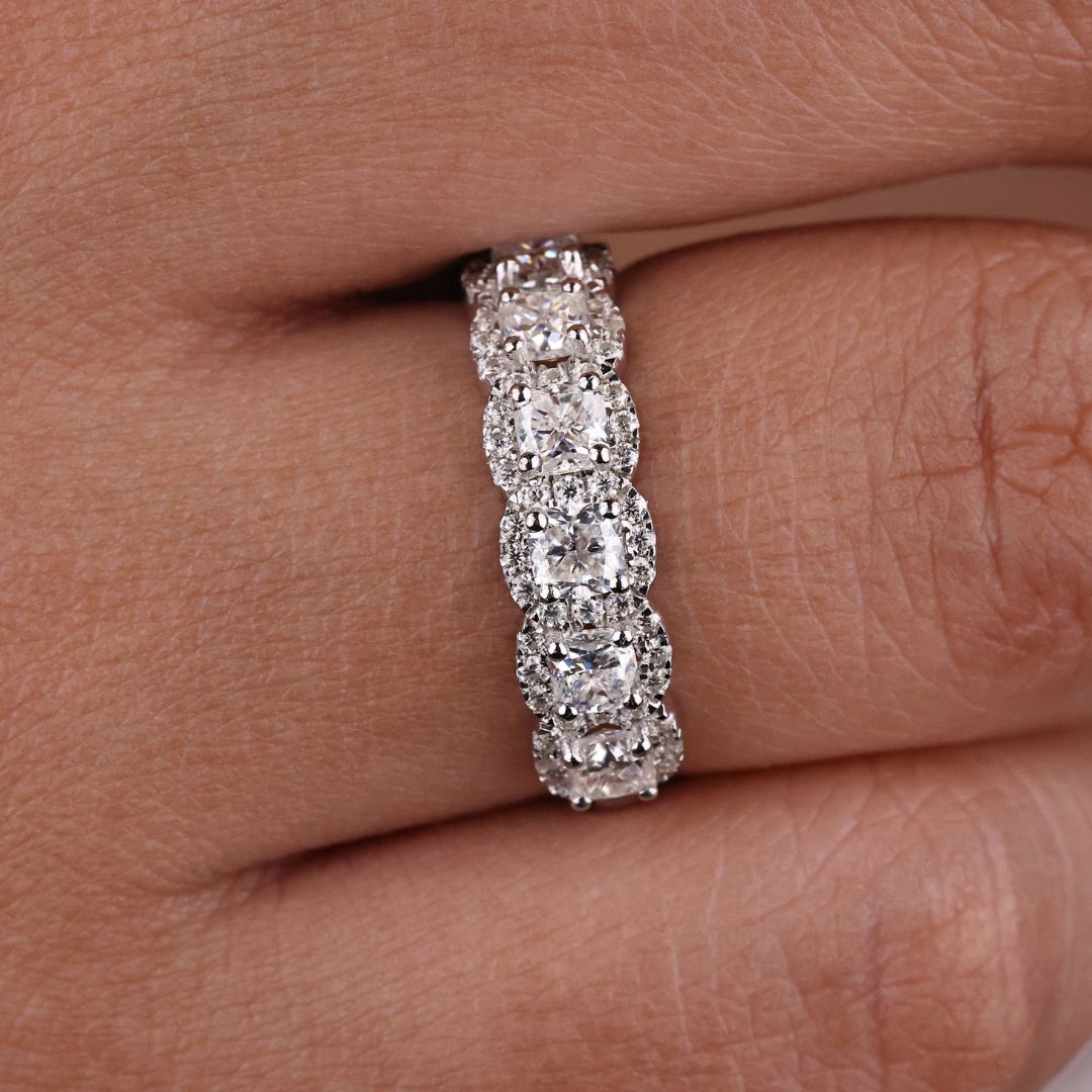 Seven stone wedding band adds symbolic brilliance with seven sparkling stones set in a sleek design.
