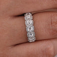 Seven stone wedding band adds symbolic brilliance with seven sparkling stones set in a sleek design.
