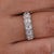 Seven stone wedding band adds symbolic brilliance with seven sparkling stones set in a sleek design.
