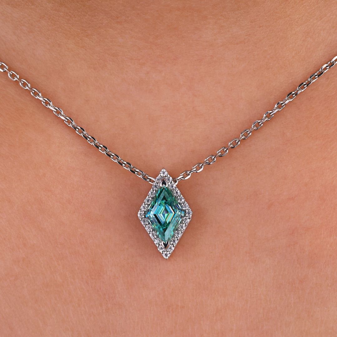 Lozenge cut pendant with a stunning moissanite stone.
