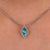 Lozenge cut pendant with a stunning moissanite stone.

