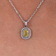 Double halo pendant necklace with radiant cut center stone.