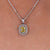 Double halo pendant necklace with radiant cut center stone.