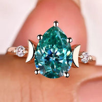 Pear Cut Engagement Ring with Trilogy Setting