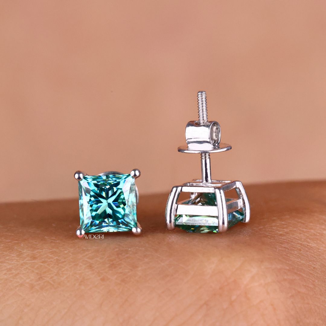 Stunning Princess Cut earrings with screw back earrings in white gold.