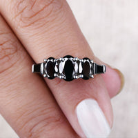 Black Oval Cut Moissanite Ring – 5 Stone Design