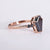 Coffin engagement ring with a stunning round cut ring design.
