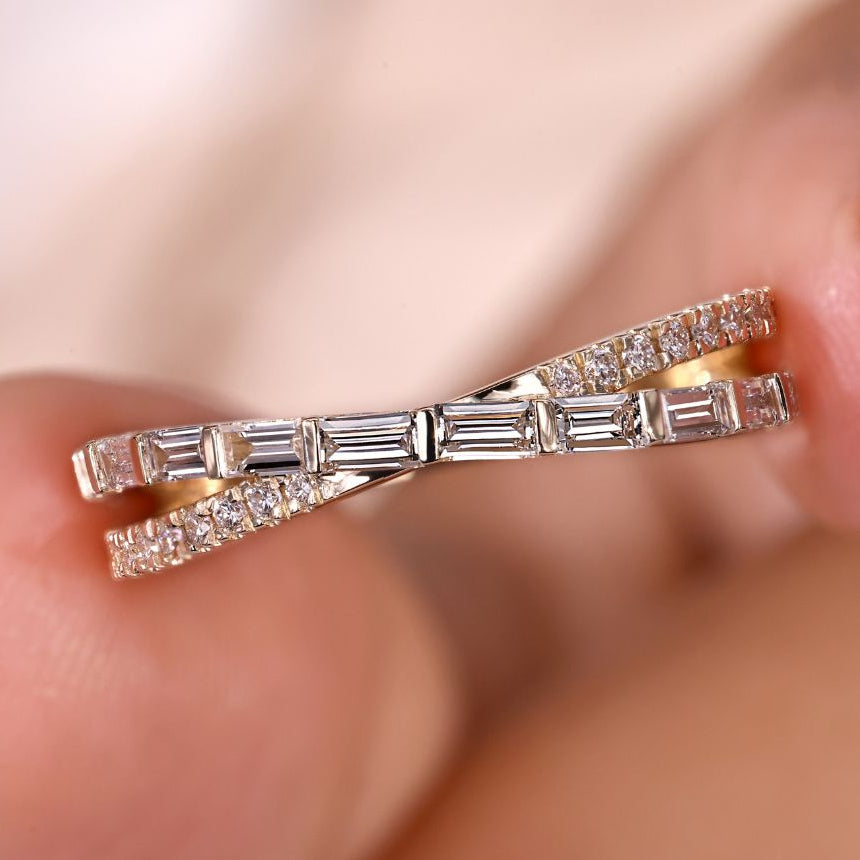 Crossover wedding band featuring brilliant diamonds.

