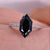White gold ring featuring fine polished details.
