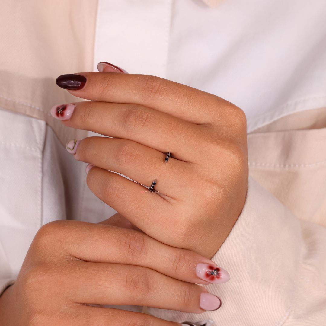 A round and marquise wedding band combines two classic shapes.