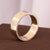 Wider Band Men's Moissanite Eternity Wedding Band with round cut moissanite stones.

