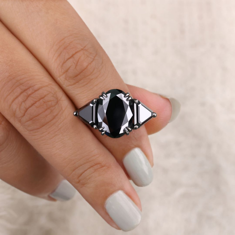 Three stone oval engagement ring with brilliant sparkle.
