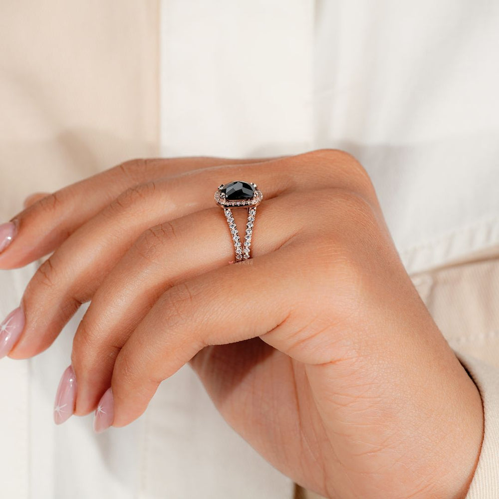 Cushion cut ring with rose cut accents for a modern and elegant look.
