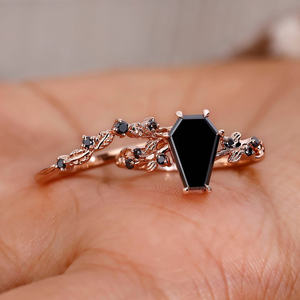 Filigree engagement ring featuring a stunning coffin ring design.