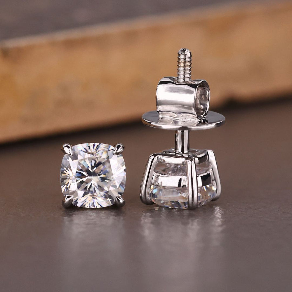 Cushion cut earrings shine with elegant, rounded edges.
