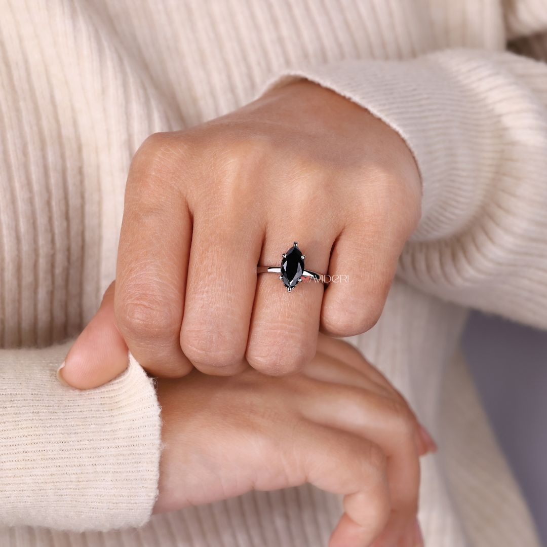 Engagement rings 6 prong pave hidden halo featuring marquise moissanite.
