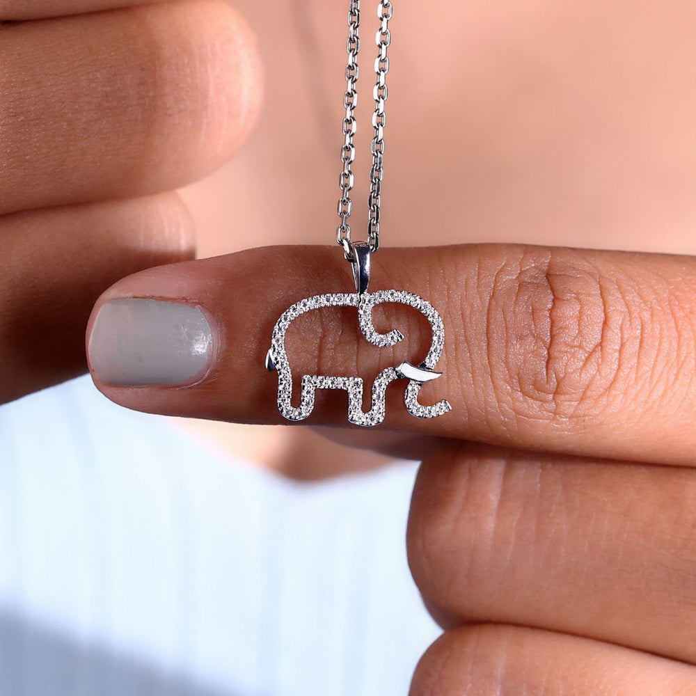 Elephant pendant in polished white gold.
