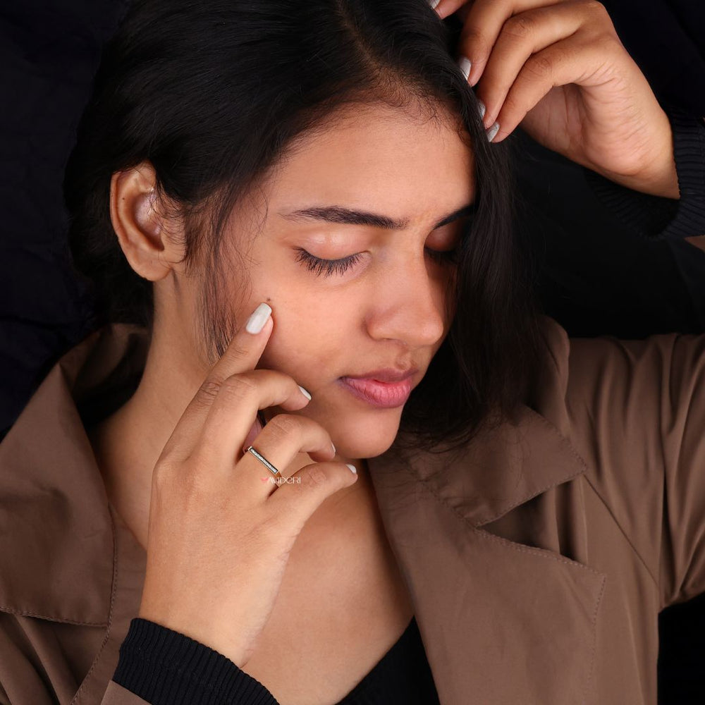 Round cut band delivers timeless elegance with smooth curves and brilliant sparkle.
