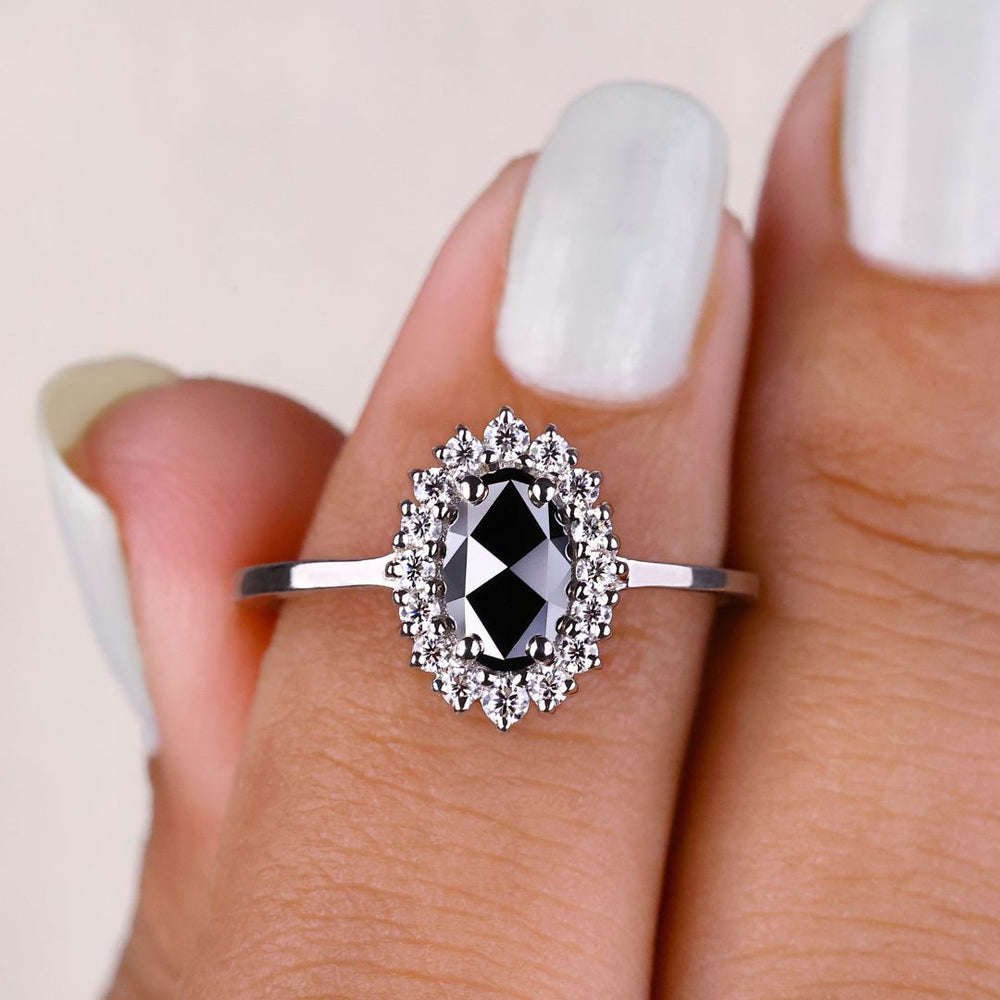 Oval cut moissanite ring featuring a stunning sparkle and unique design.
