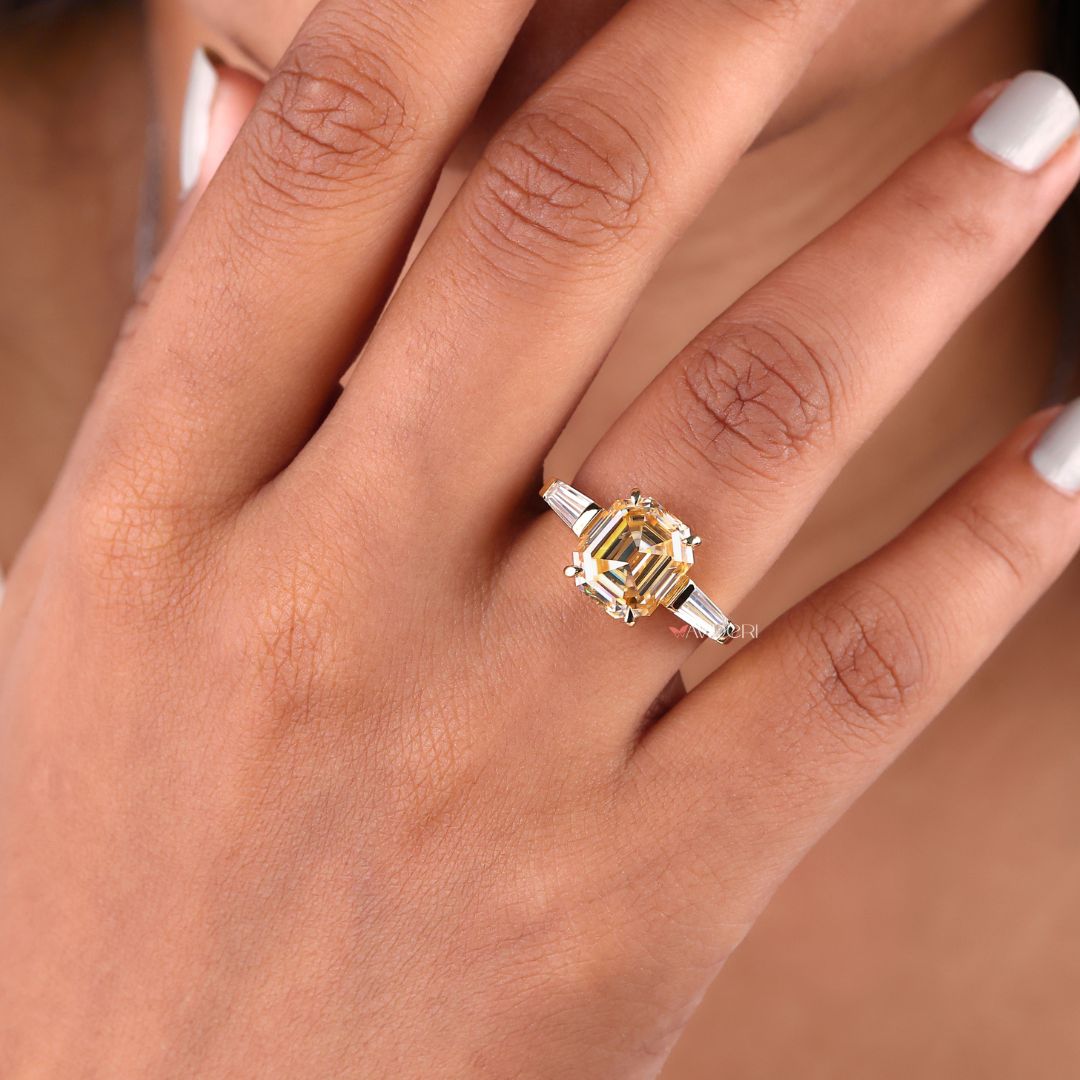 Three stone engagement ring in a bar setting style

