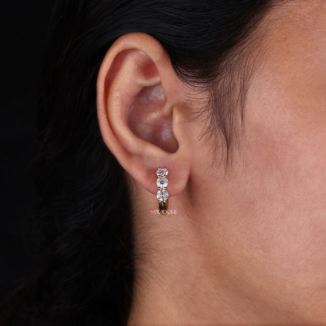 Yellow gold earrings bring warmth and shine to your look.