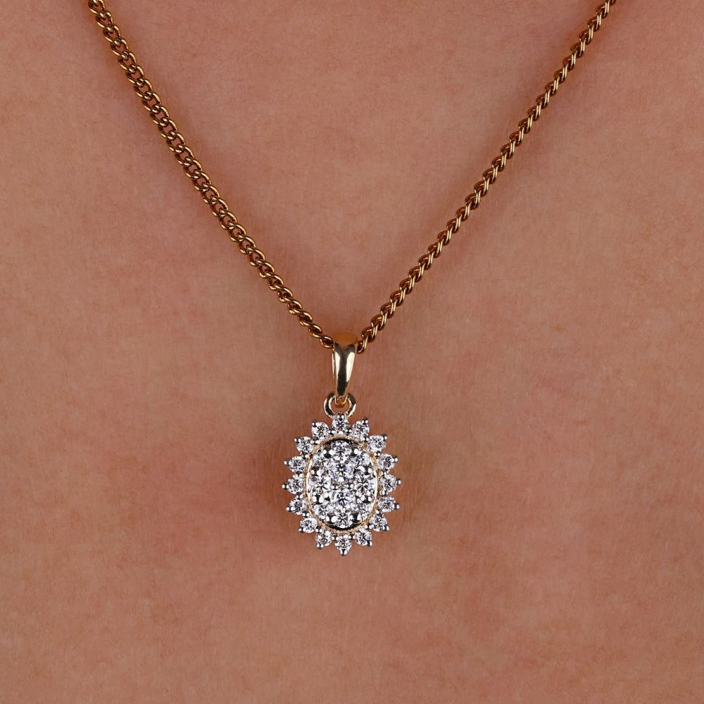 Sunburst halo oval shape wedding pendant with a radiant design.