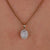 Sunburst halo oval shape wedding pendant with a radiant design.