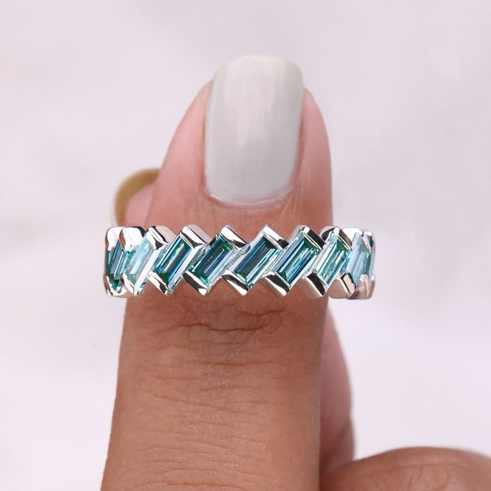 Baguette half eternity band showcases clean, elegant baguette stones set halfway around the band.
