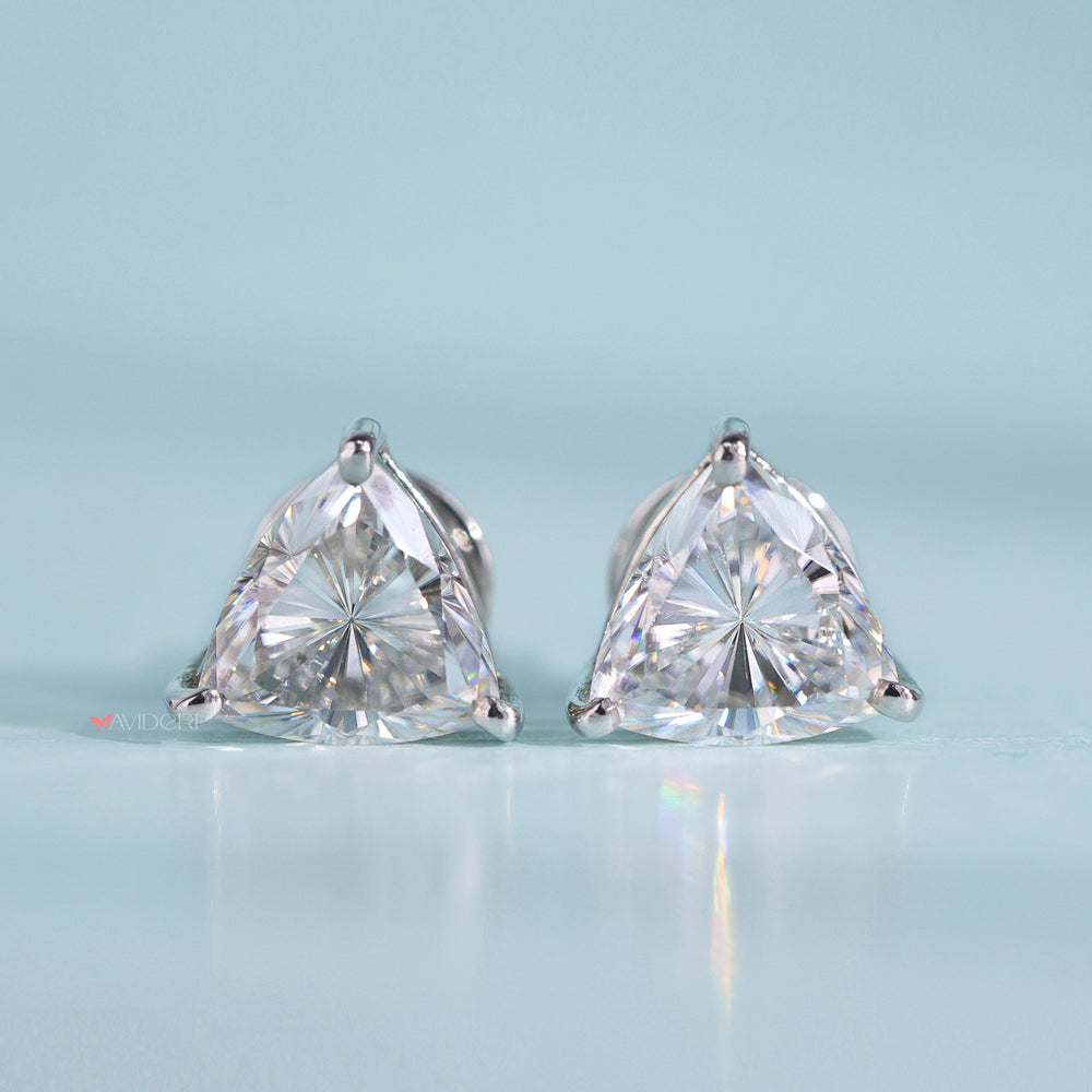 Three prong earrings offer a sleek and secure design.