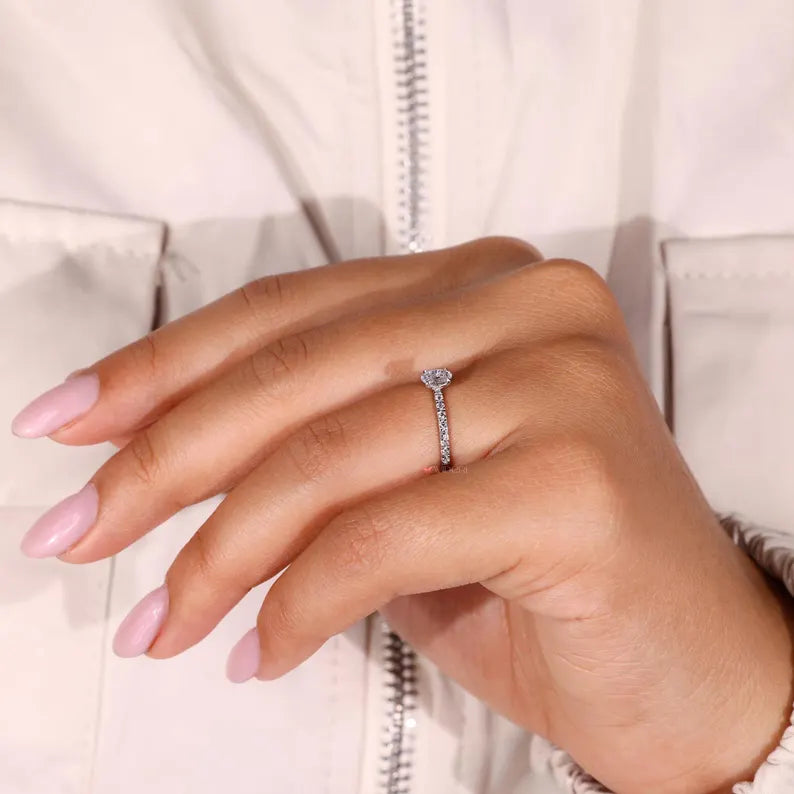 Round brilliant cut diamond ring in a prong setting.

