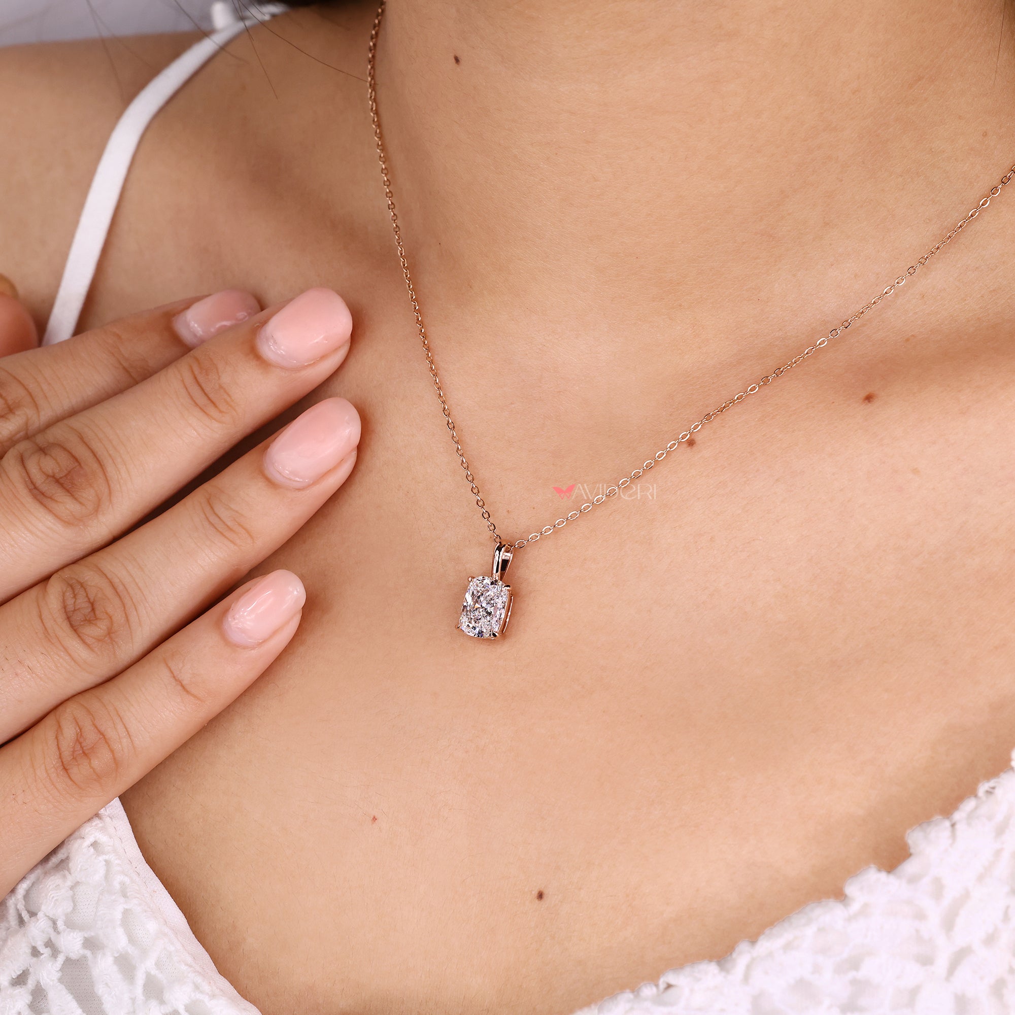 Handmade jewelry pendant featuring cushion cut diamond.
