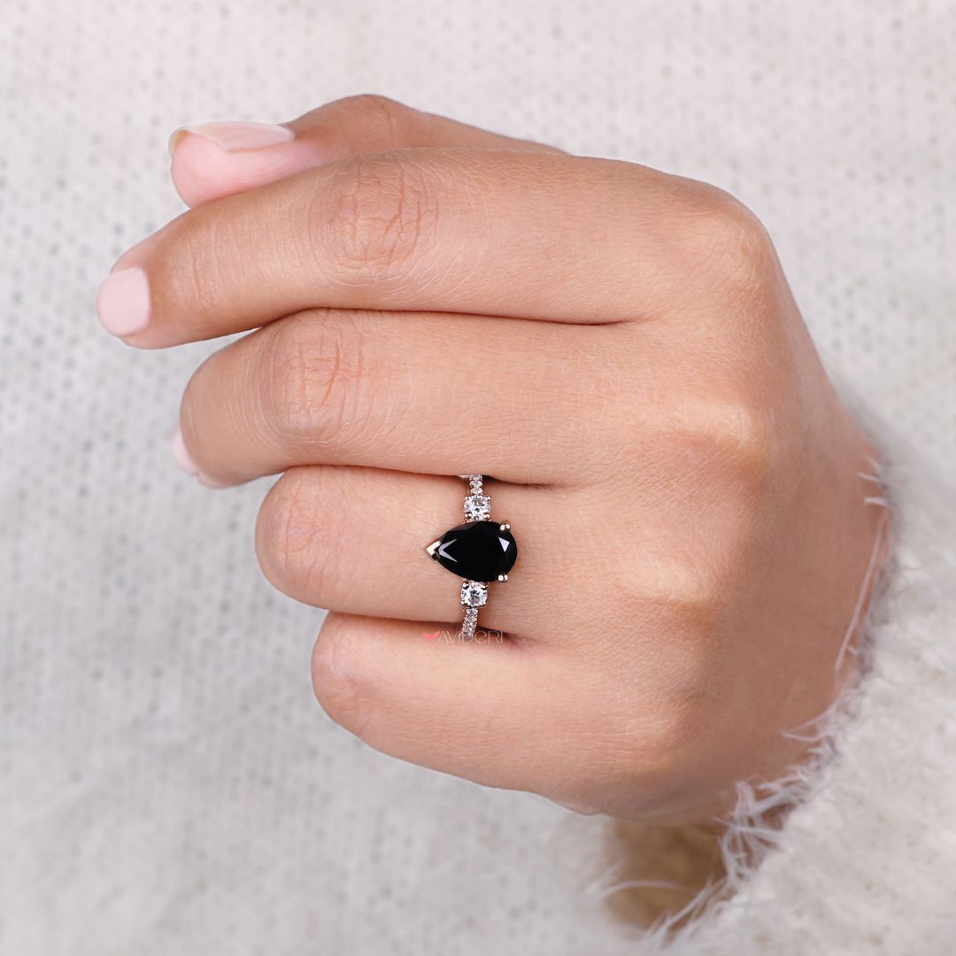 Three stone round engagement ring for a timeless and elegant appeal
