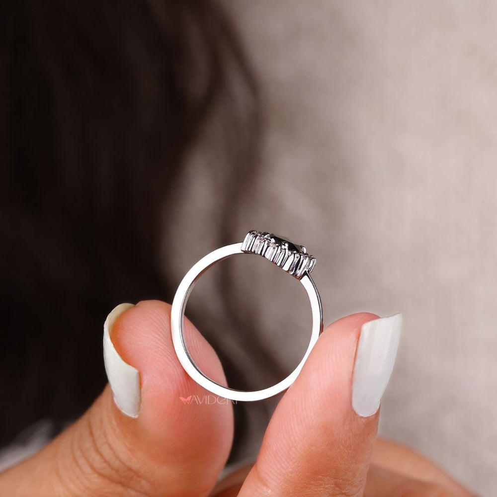 White Gold engagement ring with an oval cut moissanite stone for elegance.

