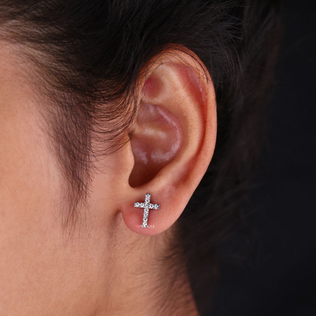 Round cut earrings featuring Moissanite for a timeless cross stud design.