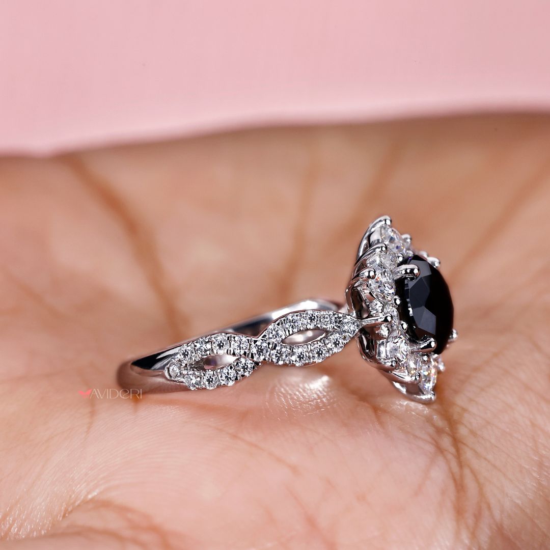 Twisted pave engagement ring with a round cut ring for a unique design.
