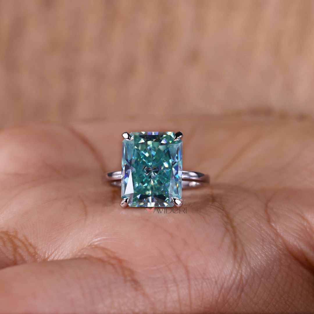 The 4 prong ring supports stones with a minimalist touch.

