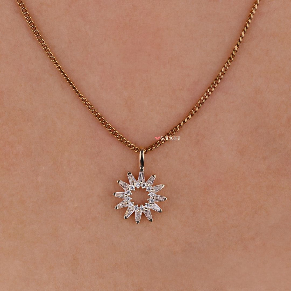 Tapered baguette pendant with elegant stone settings.
