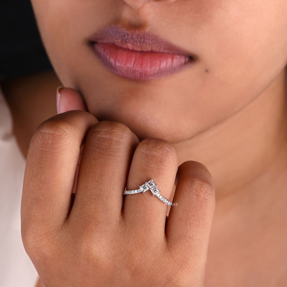 Gold chevron wedding band adds a luxurious touch with bold, geometric style and warm gold tones.
