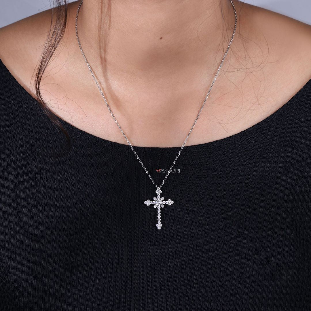 Round cut cross pendant highlights faith with perfect symmetry.