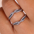 The wrap guard wedding band adds style and extra protection.