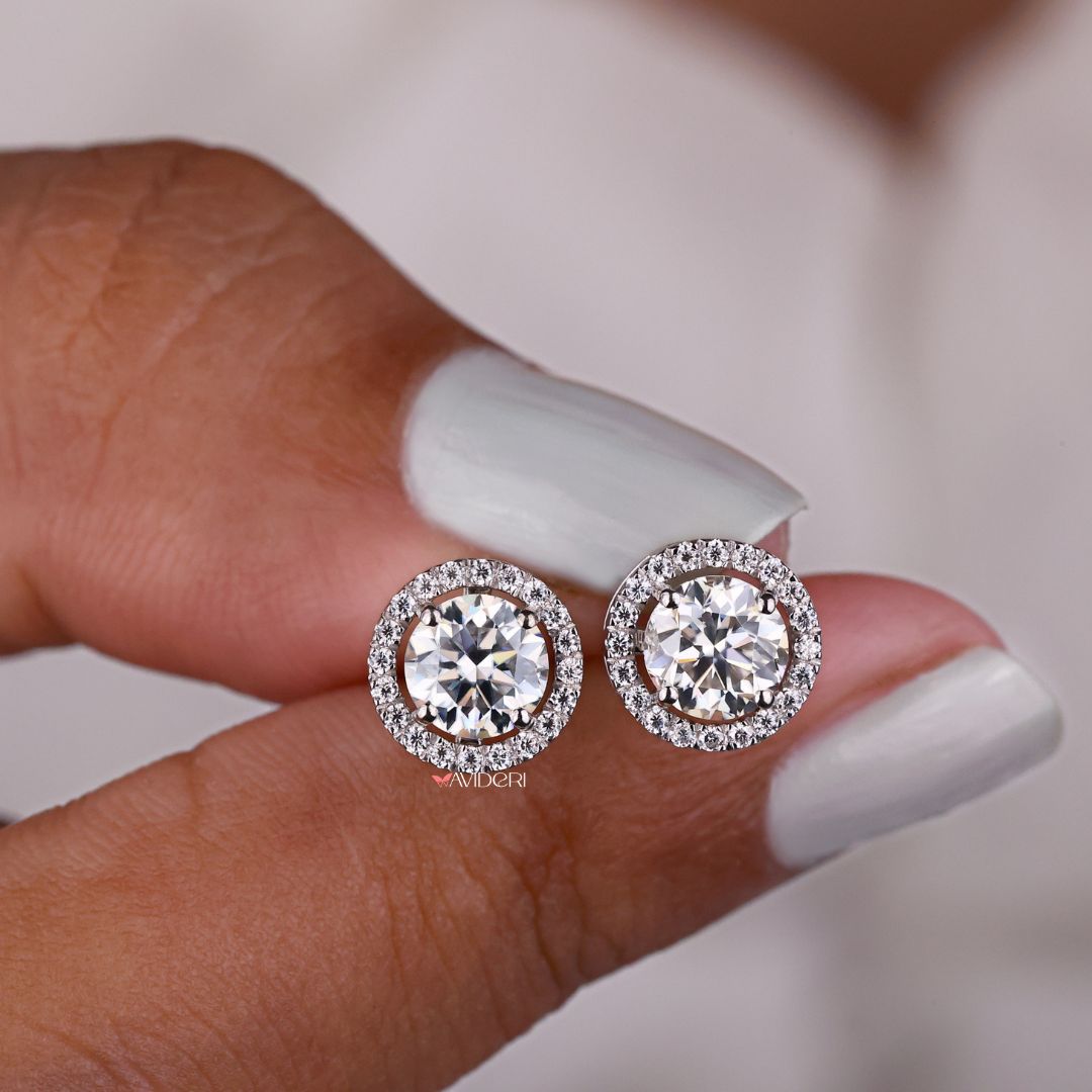 Round Cut Halo Moissanite Earrings, combining the brilliance of round Moissanite with a dazzling halo.