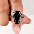 Coffin engagement ring featuring a stunning black moissanite ring.
