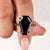 Coffin engagement ring featuring a stunning black moissanite ring.
