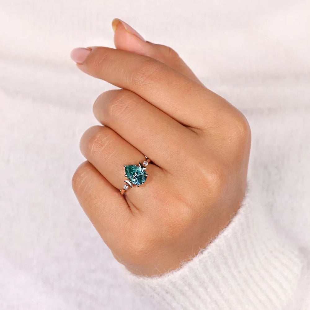 Trilogy Three Stone Engagement Ring shows a stunning symbolic design.
