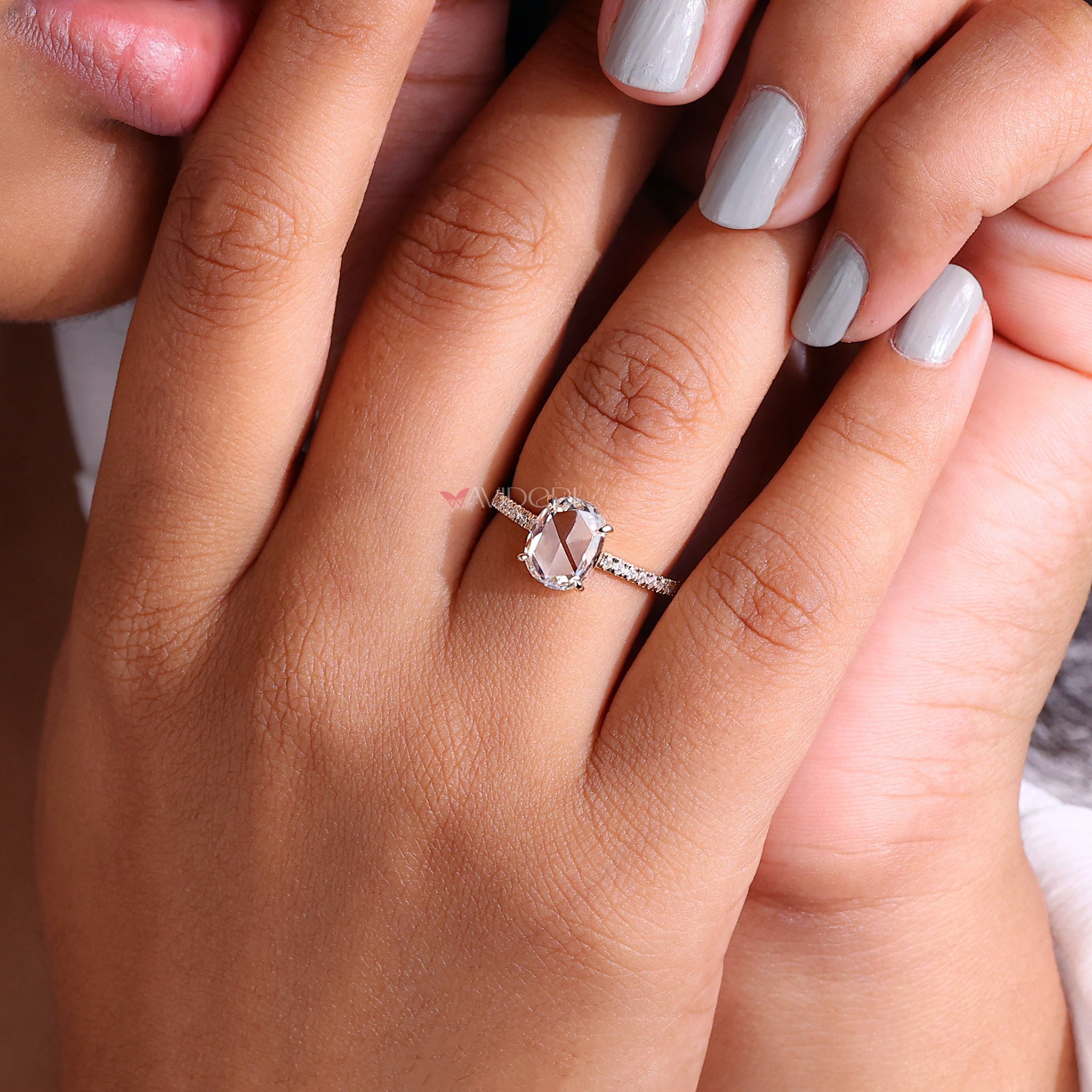 Diamond ring cushion with classic elegance, ideal for engagement or anniversary celebrations.