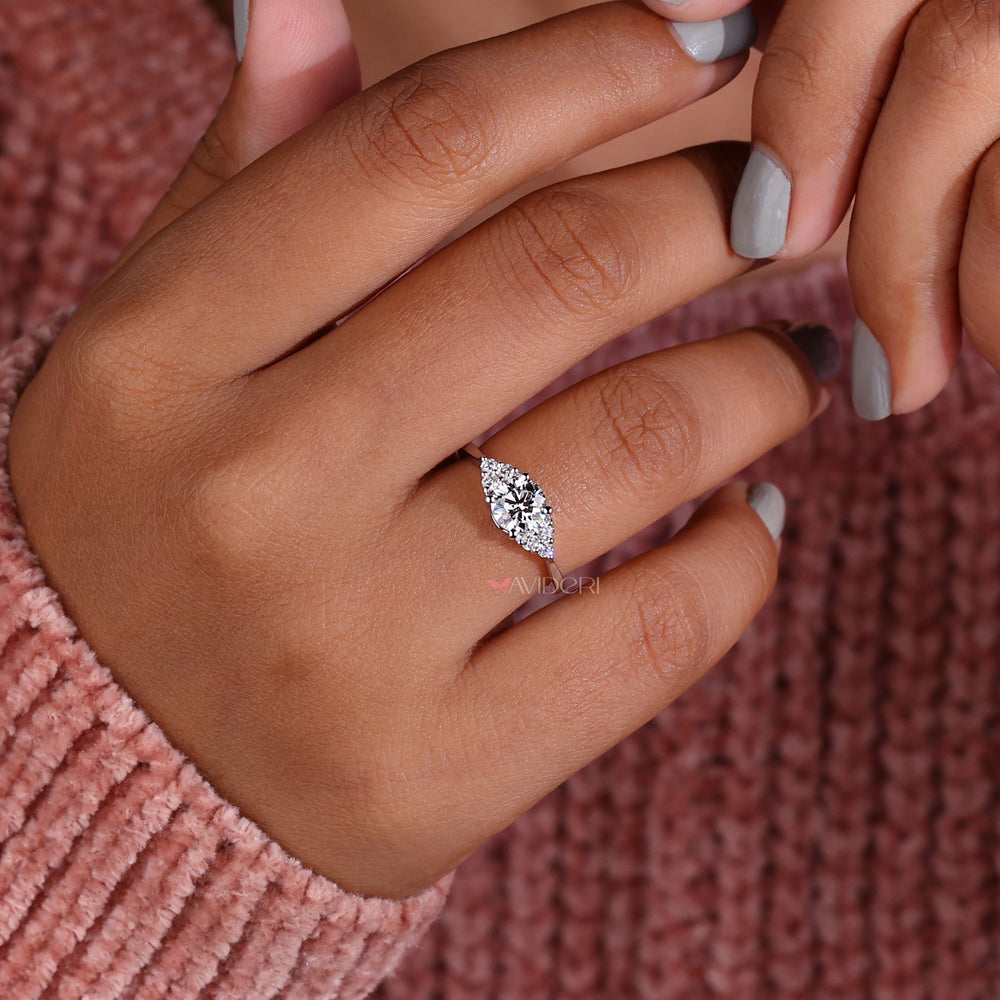 Unique Tapered Shank Engagement Ring with stunning diamond accents.